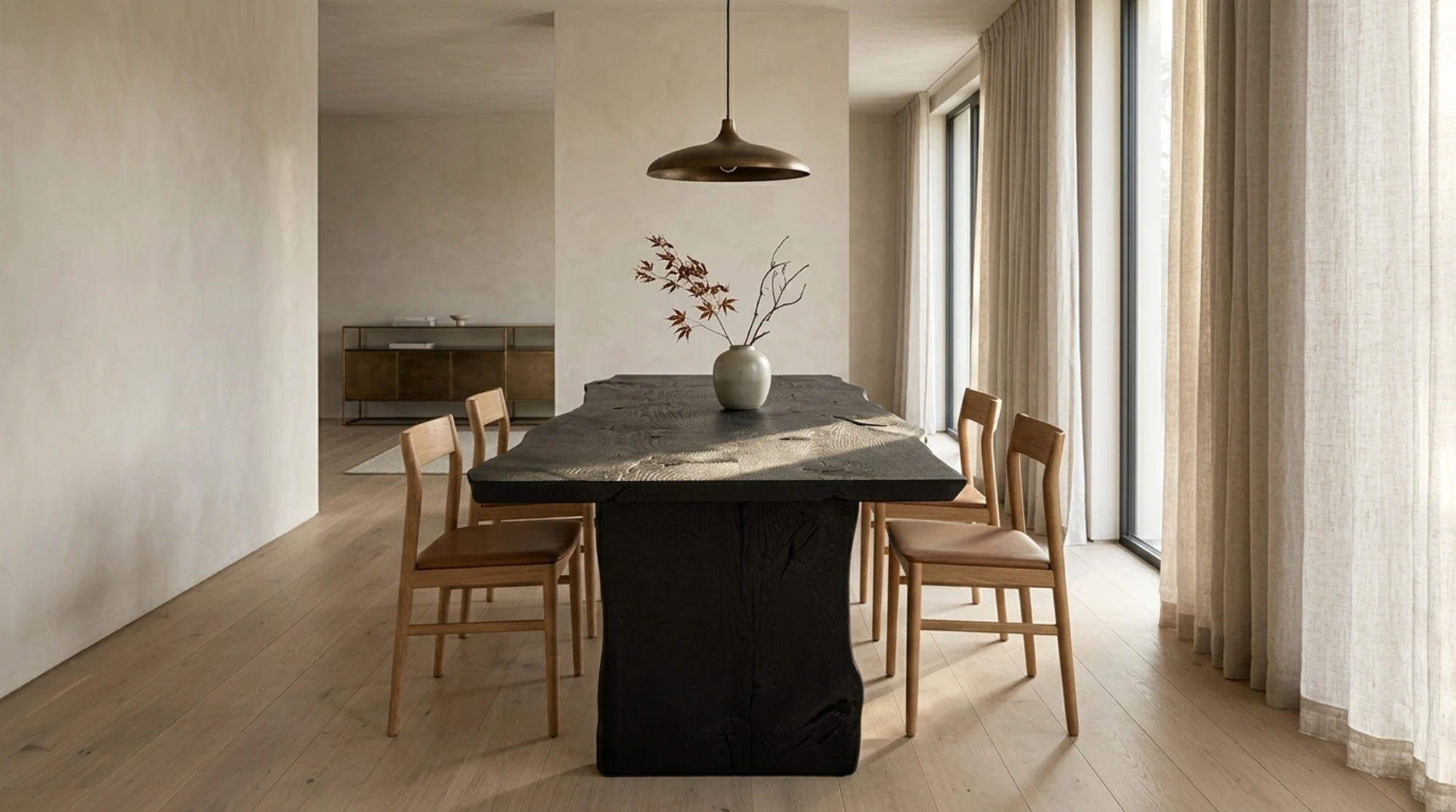 ROHN Studio Ember collection campaign photography, charred dining table in a dark room