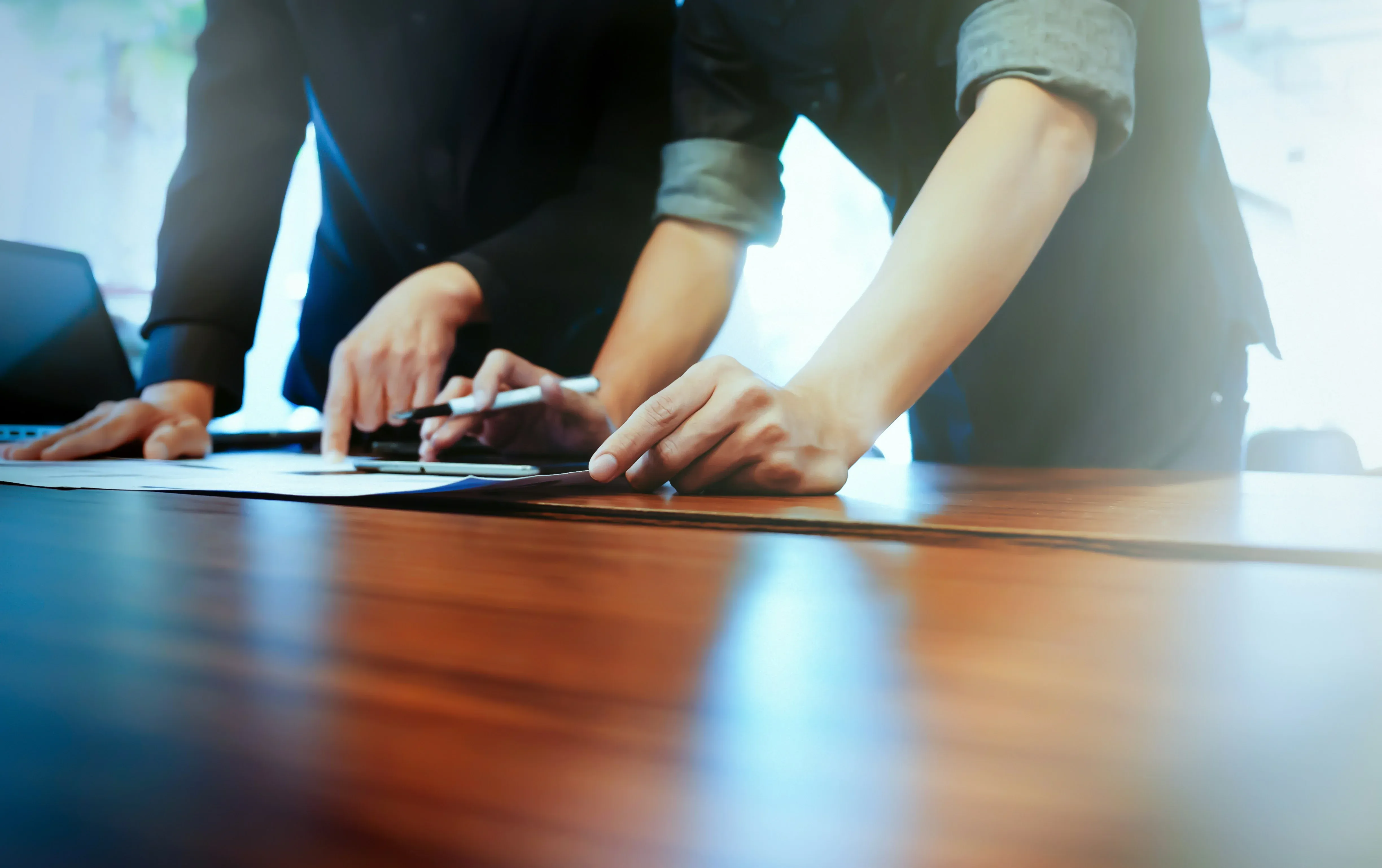 Two people working through a brand story at a table
